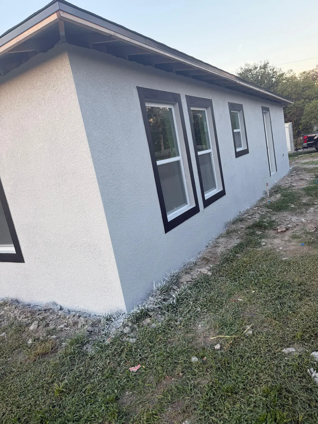 New stucco and paint on a home exterior