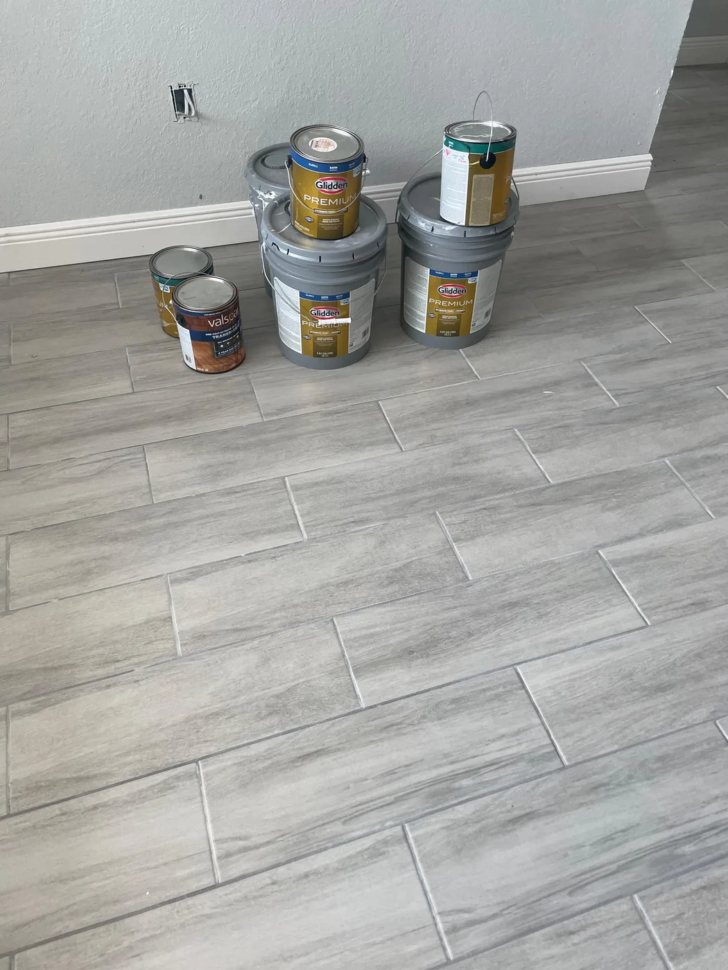 New tile flooring installed through a home
