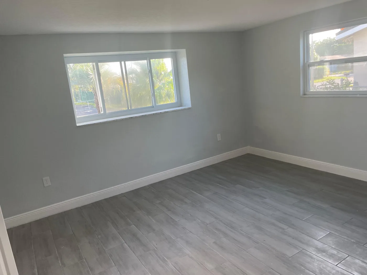 Freshly remodeled room with new paint and floors